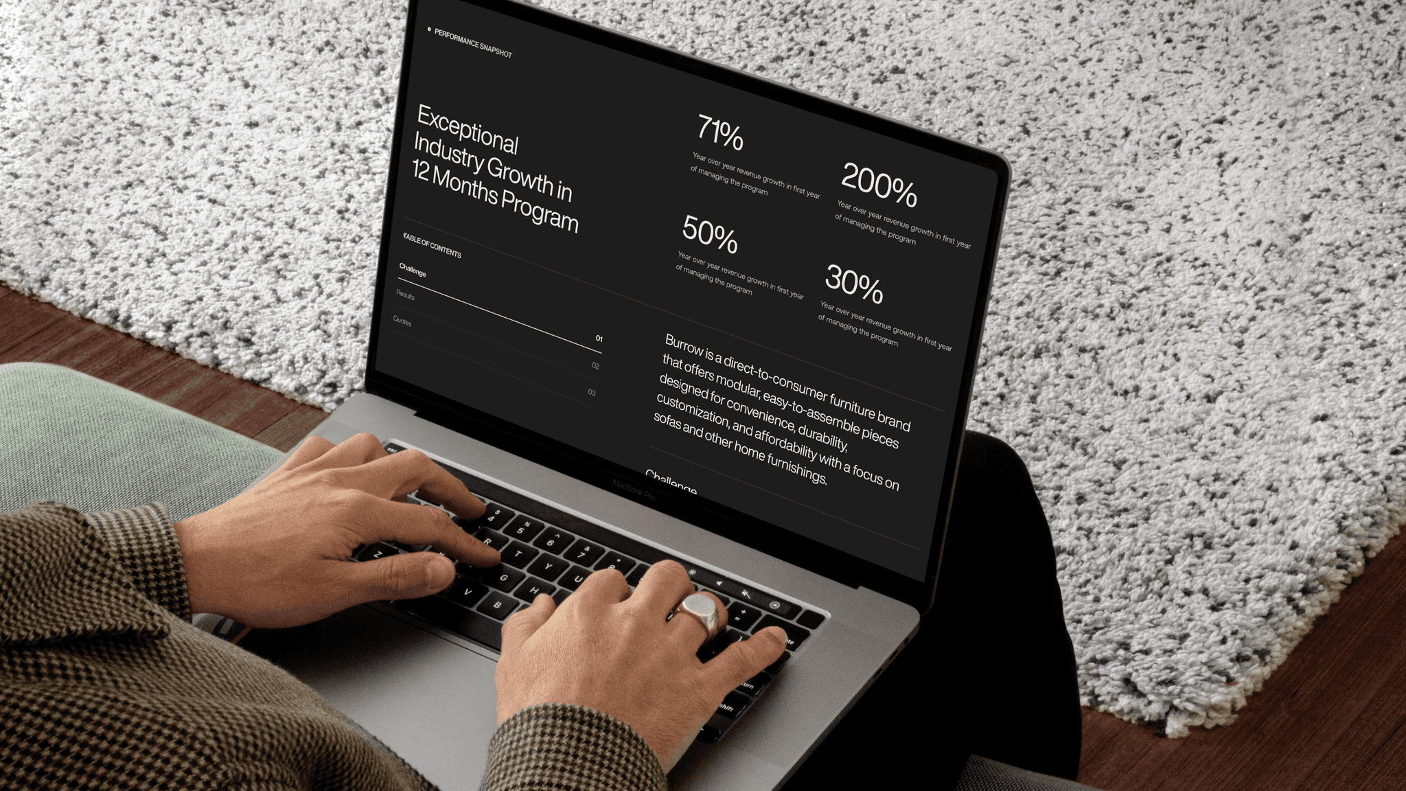 A laptop in warm light showing the website's results page with large percentage figures