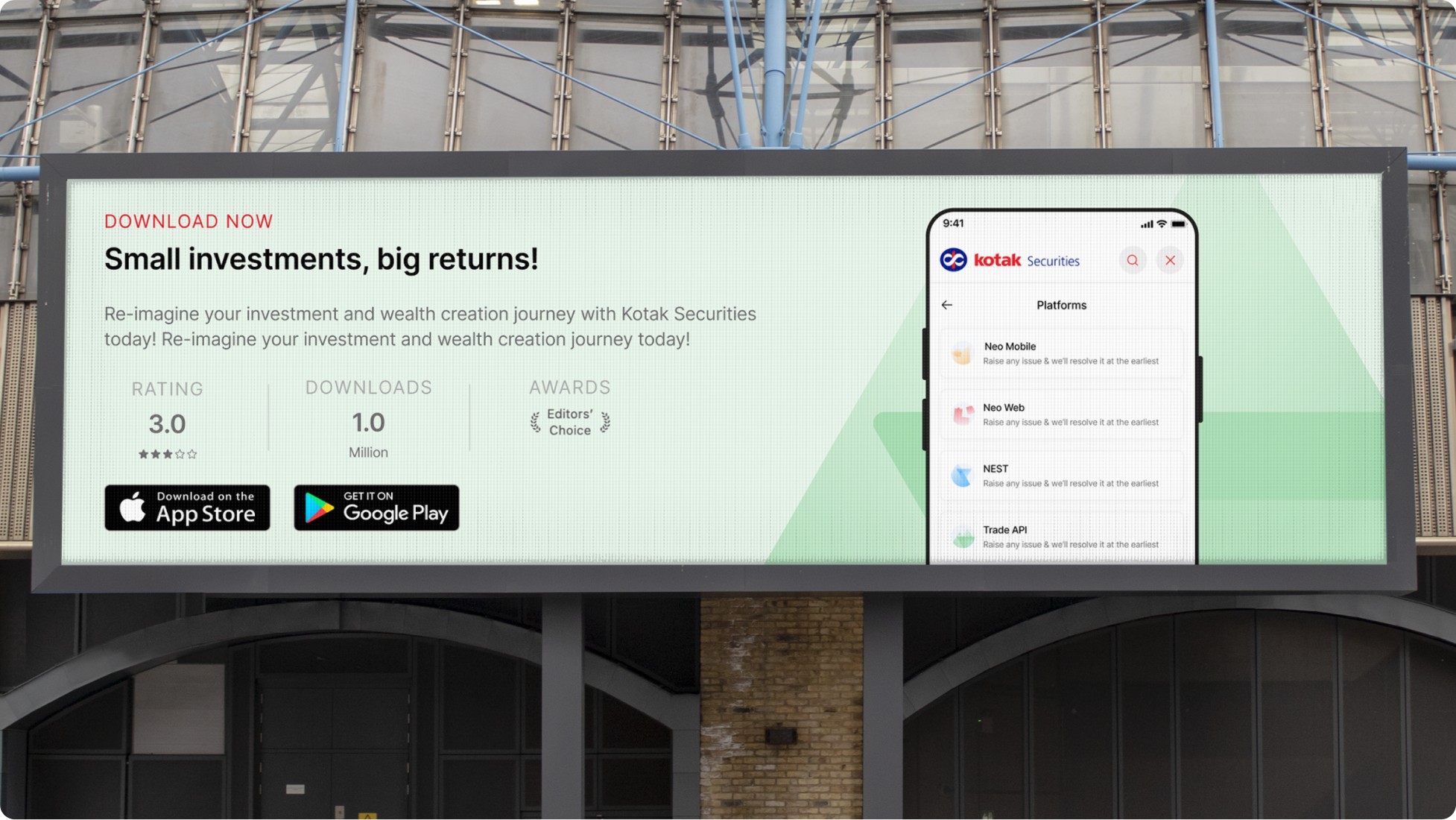 A railway-station billboard showing the Kotak Securities app campaign: Small investments, big returns